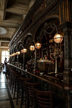 an old fashioned bar with lots of chairs