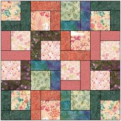 a patchwork quilt with different colors and patterns