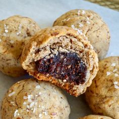 several cookies are stacked on top of each other and one is filled with nutritious toppings