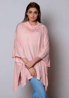 This unique rollneck poncho is knitted from a very soft bamboo and elevated by tonal pink dainty floral lace appliques the neck and multi-colored Swarovski crystals along the shoulders. This flamboyant accessory keeps you stylishly warm whilst making heads turn. Poncho Jacket, Capes & Ponchos, Luxe Gifts, Cashmere Wool, Fall Collections, Lace Applique, Appliques, Summer Collection, Floral Lace