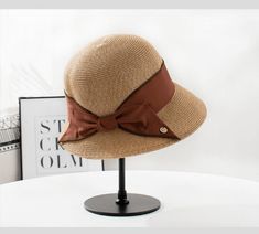 Cute straw hat with a variety of colours to choose. Perfect for daily wear! It is nicely crafted with premium quality of straw.An ideal gift for her!Specifications-Material: 100% straw-Size: 56-58cm Brown Paper Straw Hat With Short Brim, Brown Paper Straw Fedora Hat, Brown Straw Hat With Short Brim, Brown Woven Straw Bucket Hat, Short Brim Brown Straw Hat, Brown Short Brim Straw Hat, Brown Straw Boater Hat With Short Brim, Brown Brimmed Paper Straw Hat, Adjustable Woven Straw Cloche Hat