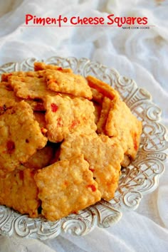 some kind of cracker on a plate with the words priment to cheese squares