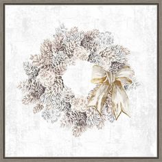 a white wreath with gold bow hanging from the front of a framed wall art print