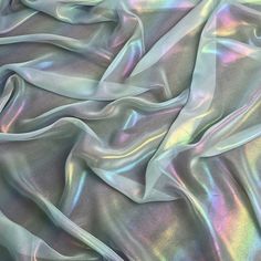 an image of a shiny fabric that is very soft