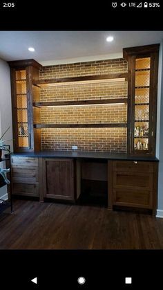 a room that has some wooden cabinets in it