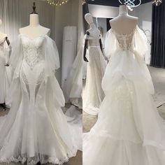 wedding gowns are displayed on mannequins at a bridal showroom