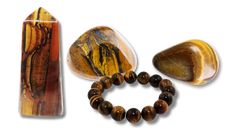 three different types of stones and beads on a white background