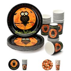 an assortment of halloween party supplies including plates, cups and napkins with owls on them