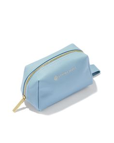 Stash all your dainty essentials while on the go in the Small Cosmetic Zip Case in Light Blue. A small pouch with a zipper closure, this travel necessity keeps your everyday essentials organized and protected. Plus, its dainty size makes it easy to store it in any purse, backpack, or duffel. Material Polyurethane Size 6.1" (L) X 3.5" (W) X 3.7" (H)Due to the one-of-a-kind nature of the medium, exact colors and patterns may vary slightly from the image shown. | Kendra Scott Small Cosmetic Zip Case in Light Blue | Leather Blue Kendra Scott, Kendra Scott Store, Travel Necessities, Purse Backpack, Small Pouch, Stocking Stuffer Gifts, Makeup Bags, Small Pouches, Small Accessories