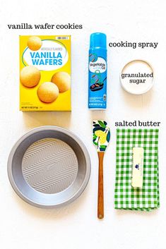 ingredients needed to make vanilla wafer cookies laid out on a white surface with green checkered napkins