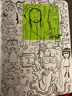 an open notebook with some drawings on it