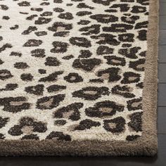 an animal print rug on a wooden floor