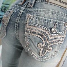 Rock Revival Womens Easy Bling Crystal Rhinestone Boot Cut Stretch Jeans New Brand New With Tags Size 27 28 Same Day Shipping On Orders Placed By 3 Pm Extravagant Fading Details Run The Length Of This Embroidery Accent Jeans. Curvy Fit, Eased Through The Hip And Thigh Zip Fly With Button Closure Aprox 32” Inseam 5 Pocket Construction - Pocket Embroidery Accents - Fading Details - Imported 98% Cotton, 2% Elastane Machine Wash Cold 2000 Rock Aesthetic, Rock Revival Jeans Outfit, Rock Rival Jeans, Flair Jeans Outfit, Quinceanera Stuff, Handmade Jeans, Summer 2000s, Pink Quinceanera, Dream Things