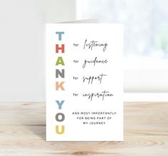 a thank card with the words thank you written in multicolored letters on it