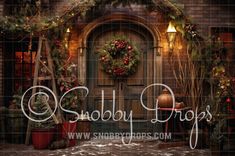 a christmas display with wreaths and lights on the front door to a house that is decorated for holiday