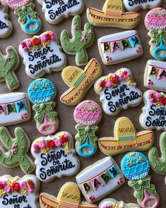 some decorated cookies that are on a table