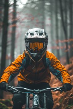 a person riding a bike in the woods