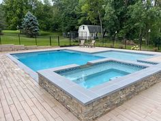 Geometric Pool Large Tanning Ledge Pool, Rectangle Pool With Spa And Sun Shelf, Rectangular Pool With Tanning Ledge, Pool With Hot Tub And Tanning Ledge, Pool With Raised Spa, Rectangle Swimming Pools, Raised Pools, Tree Landscaping, Tanning Ledge Pool