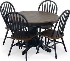 a wooden table with four chairs around it