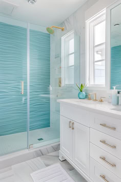 40 Refreshing Coastal Bathroom Ideas for Ocean Vibes Beach Condo Bathroom Remodel, Beach Tile Bathroom, Bathroom Coastal Modern, Fun Pool Bathroom Ideas, Bathroom Design Coastal, Ocean Tile Bathroom, Coastal Bathroom Shower Tile Ideas, Coastal Small Bathroom Ideas, Blue Shower Room