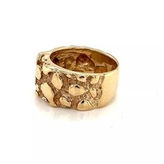 This is a vintage wide band ring, it is crafted from 14k yellow gold featuring and front half with the nugget style. The back of the band is in polished finish.     Material:  14k yellow gold  Measurement: 0.43" wide x 0.15" high  Ring Size:  6.5  Weight: 11.2 grams The Nugget, Wide Band Ring, Wide Band Rings, Yellow Gold Ring, The Band, Wide Bands, Yellow Gold Rings, Band Ring, Gold Ring