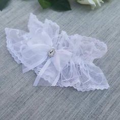 This is an exquisite white wedding bridal garter. Standard size. Wedding Leg Garter, Bride Garter, Leg Garter, Lace Accessories, Leg Bands, Bridal Garter, Wedding Garter, White Wedding, Wedding Bridal