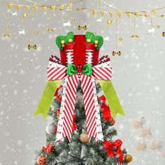 a decorated christmas tree with presents on top