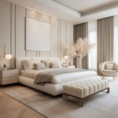 a large white bed sitting in the middle of a bedroom