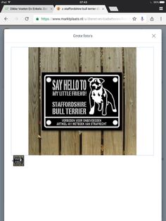 a screen shot of a website page with an image of a dog on the sign