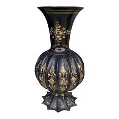 an ornate black vase with gold designs on the top and bottom, sitting against a white background