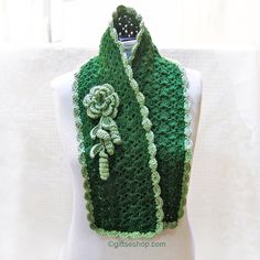 "The pattern in English only. Green Crochet Scarf PATTERN. Lace crochet scarf pattern Pattern is detailed and easy to follow! You will get: 7 pages, 2 pictures, 1 diagram. * Text description row by row  Include   Triple Layer 6 Petals Flower Pattern and  sprigs of leaves  pattern. The pattern is written in English, using US terms.   You need aprox. 150g dark green yarn and about 50g light green. Yarn: category 4 worsted weight: afghan, aran yarn  UK/Australia approximate equivalent: 10 ply, Aran Lace Crochet Scarf, Green Scarves, Scarves Crochet, Hand Knitted Scarf, Crochet Scarf Pattern, Crochet Scarfs, Crochet Neck Warmer, Green Crochet, Hand Knit Scarf