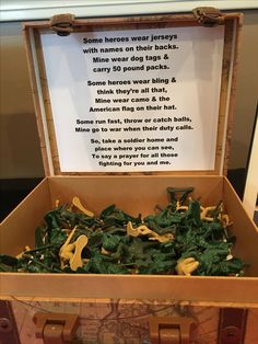 an open suitcase filled with spinach leaves and poem in it's lid reads some hero wear jeseys