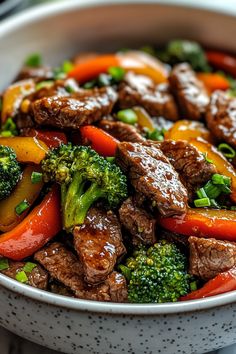 beef and broccoli stir fry in a bowl