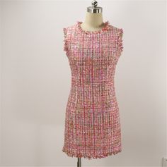 Discover the charm of our Women's Custom-Made Round Neck Tweed Sheath Dress in Pink. This versatile dress is perfect for various occasions, including wedding Guest , birthday parties, or as a thoughtful and personal gift. ✨ Dress Features: Round neck design for a classic and timeless look. Available in sleeveless, short sleeves, or long sleeves options for your preference. Beautifully crafted sheath silhouette for a flattering fit. Custom-made to your measurements for the perfect look and feel. Tweed And Tulle Dress, Luxury A-line Tweed Dress For Formal Events, Luxury Sequined Tweed Dress, Luxury Fitted Tweed Dress For Semi-formal Events, Luxury Formal Tweed Dress For Fall, Luxury Evening Mini Length Tweed Dress, Luxury Wool Tweed Dress For Formal Occasions, Chanel Tweed Dress 2021, Fitted Pink Tweed Dress For Party