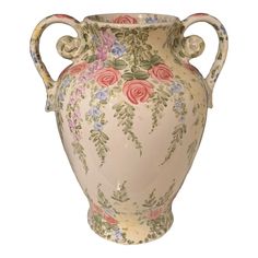 a large vase with flowers painted on it's sides and handles, sitting against a white background