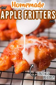 homemade apple fritters are being drizzled with icing on a cooling rack