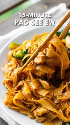 a skillet filled with noodles and vegetables on top of a table next to the words 15 - minute pad seew