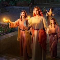 the three women are holding candles in their hands