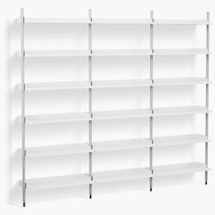 a white book shelf with four shelves on each side