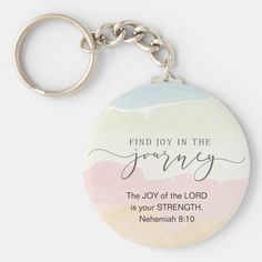 a keychain with the words, find joy in the journey