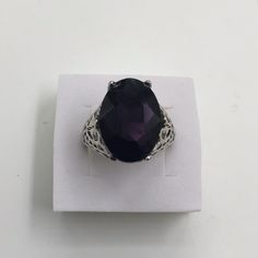 Pronged 6 Carat Oval Purple Sapphire It’s A Dark Purple Hard To See In These Pictures. Stamped(Sterling Silver) I Will Ship The Same Day. Size 8. Noticed The Handmade Silver Just Gorgeous. Free Box. R10 Dark Amythest Ring, Purple Dark Ring, Victorian Purple Hallmarked Ring, Antique Oval Purple Jewelry, Elegant Silver Amethyst Ring, Oval Cabochon, Purple Ring, Free Boxes, Purple Sapphire, Ring Ideas