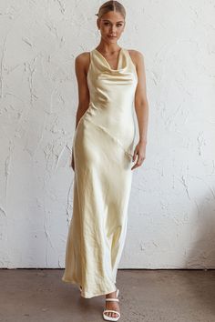 Butter maxi dress Not lined Cowl neck Open back with tie Zipper on the side You'll look like you just stepped straight off the red carpet in our gorgeous Cassiopeia dress. Featuring a cowl neckline and an open, cowl back. It's perfect for a wedding or special birthday celebration. Team it with diamante heels and a clutch for a showstopping look. MODEL INFO Model is wearing size XS Height: 5'8" Bust: 32" Waist: 25" Hips: 35" SIZE INFO Flat garment measurements This was manually measured from the Cowl Neckline Dress, Open Back Maxi Dress, Yellow Bridesmaids, Purple Bridesmaids, Red Bridesmaids, Veil Hairstyles, Cowl Neck Dress, Blue Bridesmaids, Iron Material