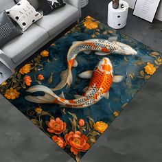 a rug with two koi fish swimming in water surrounded by orange flowers and leaves