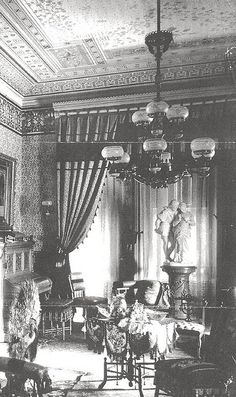 an old black and white photo of a living room