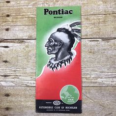 the front of a box of ponifac chewing sitting on top of a wooden table