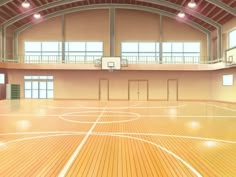 an indoor basketball court with wooden floors and windows