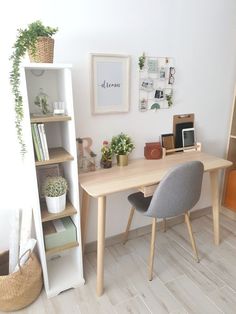 a room with a desk, chair and bookshelf