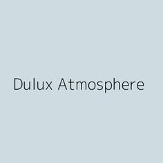 the words dulux atmospher are in black and white on a light blue background