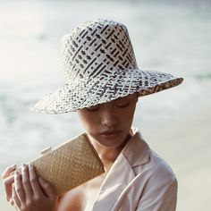 Handmade wide round straw hat made of Lontar straw by artisans in Borneo. Each Lontar straws were dyed manually with natural ink materials. Its flexible structure helps this hat to fit comfortably, but still manage its beautiful sturdy shape. Dimension: around 13 inches Head Measurement diameter: around 7 inches Straw Bucket Hat, Straw Sun Hat, Fashion Line, Balinese, Hat Making, Wide Brimmed, Straw Hat, Hat Hairstyles, Sun Hats