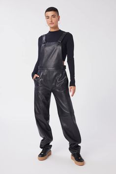 The utilitarian jumpsuit is elevated in soft, supple lambskin leather with adjustable antique nickel fasteners, fitted bodice and relaxed, straight leg. 100% lambskin leather Made in India Concealed side zip closure Planet first packaging: items are shipped in home compostable or recyclable mailers Cap Rising, Leather Overalls, Leather Jumpsuit, Leather Cleaning, Lambskin Leather, Back Strap, Fitted Bodice, Leather Working, Side Zip